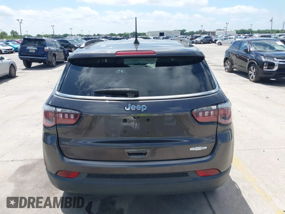 2020 Jeep Compass Latitude with VIN 3C4NJCBB3LT136018, listed as a IAAI auction lot 41915073 with 80,785 mi miles and . Bid and sale history available at carsss.com. Image 16.