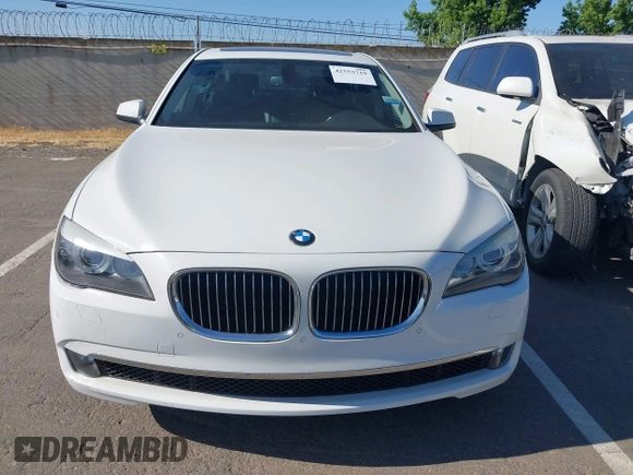 2012 BMW 7 Series 740i with VIN WBAKA4C51CDS99206, listed as a IAAI auction lot 42555719 with 104,303 mi miles and . Bid and sale history available at DreamBid. Image 6.