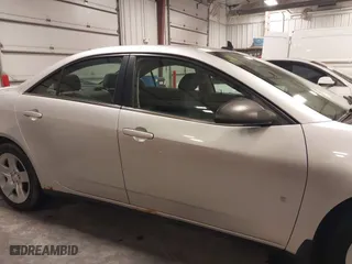 2009 Pontiac G6 w/1SA *Ltd Avail* with VIN 1G2ZG57B094155004, listed as a IAAI auction lot 41925584 with 123,169 mi miles. Bid and sale history available at carsss.com. Image 14.
