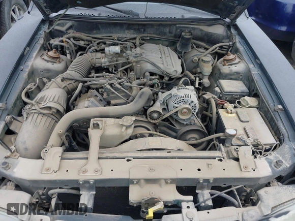 1997 Ford Mustang with VIN 1FALP4043VF158166, listed as a IAAI auction lot 39369761 with 124,992 mi miles. Bid and sale history available at carsss.com. Image 10.