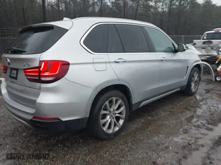 2015 BMW X5 xDrive35d with VIN 5UXKS4C51F0N06221, listed as a IAAI auction lot 41568976 with 162,442 mi miles. Bid and sale history available at carsss.com. Image 4.
