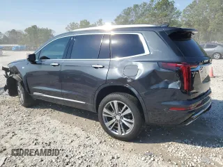 2022 Cadillac XT6 Premium Luxury with VIN 1GYKPCRS1NZ104567, listed as a Copart auction lot 47173005 with 54,541 mi miles and Clean Title. Bid and sale history available at carsss.com. Image 2.