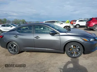 2022 Nissan Sentra SV z VIN 3N1AB8CV1NY275140, wystawiony jako IAAI lot #42156242 z przebiegiem 55 729 mil mil oraz . Historia ofert i sprzedaży dostępna na DreamBid. Obrazek 13.
