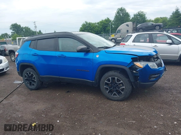2019 Jeep Compass Trailhawk z VIN 3C4NJDDB6KT760638, wystawiony jako IAAI lot #42634778 z przebiegiem 88 965 mil mil oraz . Historia ofert i sprzedaży dostępna na DreamBid. Obrazek 13.
