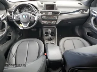 2017 BMW X1 sDrive28i with VIN WBXHU7C39H5H37756, listed as a Copart auction lot 50769975 with 82,479 mi miles and Salvage Title. Bid and sale history available at carsss.com. Image 8.