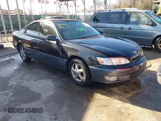 1997 Lexus ES 300 Luxury Sport Sdn with VIN JT8BF22GXV5003056, listed as a IAAI auction lot 41806886 with 130,063 mi miles. Bid and sale history available at carsss.com. Image 1.