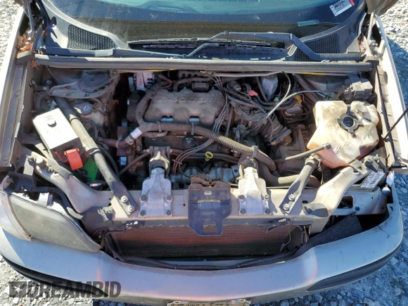 2003 Chevrolet Venture 1SA z VIN 1GNDX03E23D313074, wystawiony jako Copart lot #80559294 z przebiegiem 100 134 mil mil oraz Szkody całkowita. Historia ofert i sprzedaży dostępna na DreamBid. Obrazek 12.