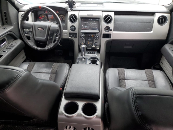 2014 Ford F-150 SVT Raptor with VIN 1FTFW1R60EFA82287, listed as a Copart auction lot 52150635 with 157,556 mi miles and Salvage Title. Bid and sale history available at carsss.com. Image 8.