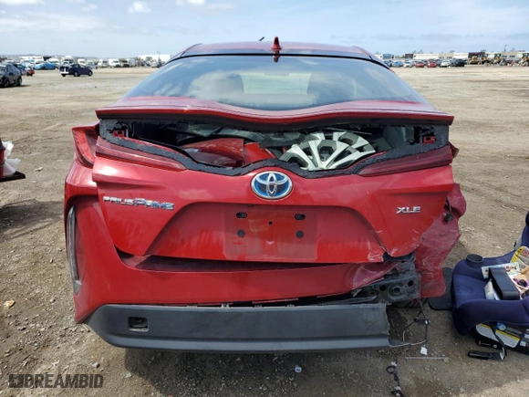 2022 Toyota Prius Prime LE with VIN JTDKAMFP7N3220095, listed as a Copart auction lot 51100625 with 52,411 mi miles and Salvage Title. Bid and sale history available at carsss.com. Image 6.