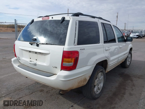 2001 Jeep Grand Cherokee Limited with VIN 1J4GW58N21C560302, listed as a IAAI auction lot 41072475 with 172,529 mi miles. Bid and sale history available at carsss.com. Image 4.