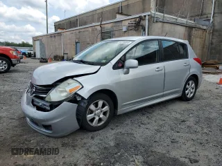 2010 Nissan Versa 1.8 SL with VIN 3N1BC1CP0AL440015, listed as a Copart auction lot 65230924 with 126,022 mi miles and Salvage Title. Bid and sale history available at carsss.com. Image 1.