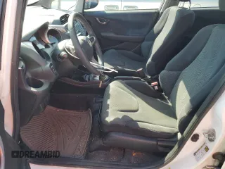 2009 Honda Fit Sport with VIN JHMGE88419C001626, listed as a Copart auction lot 52047375 with 154,585 mi miles and Salvage Title. Bid and sale history available at carsss.com. Image 7.