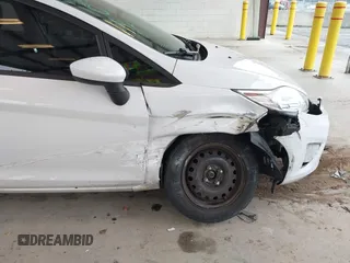 2013 Ford Fiesta S with VIN 3FADP4TJ4DM226897, listed as a IAAI auction lot 41916651 with 56,714 mi miles and . Bid and sale history available at DreamBid. Image 6.
