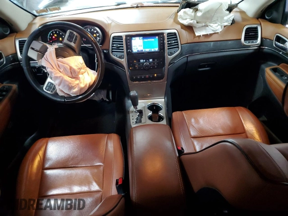 2013 Jeep Grand Cherokee Overland with VIN 1C4RJFCT7DC587329, listed as a Copart auction lot 53432625 with 98,938 mi miles and Salvage Title. Bid and sale history available at carsss.com. Image 8.
