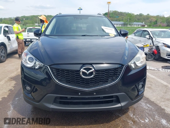 2013 Mazda CX-5 Grand Touring with VIN JM3KE4DE6D0148030, listed as a IAAI auction lot 42082947 with 119,432 mi miles and . Bid and sale history available at DreamBid. Image 12.