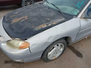 1998 Ford Escort z VIN 3FALP113XWR131538, wystawiony jako IAAI lot #41629016 z przebiegiem 121 507 mil mil oraz . Historia ofert i sprzedaży dostępna na DreamBid. Obrazek 6.