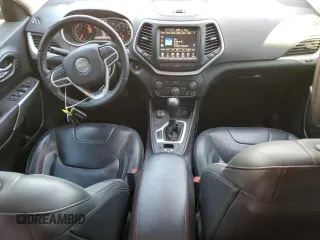 2017 Jeep Cherokee Trailhawk L Plus with VIN 1C4PJMBS6HD237128, listed as a Copart auction lot 44064115 with 105,897 mi miles and Salvage Title. Bid and sale history available at carsss.com. Image 8.