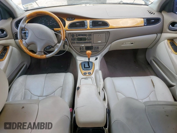 2000 Jaguar S-Type V6 z VIN SAJDA01C1YFL61738, wystawiony jako Copart lot #60363845 z przebiegiem 114 996 mil mil oraz Czysty tytuł • Clean title. Historia ofert i sprzedaży dostępna na DreamBid. Obrazek 8.