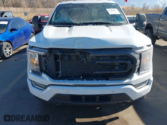 2023 Ford F-150 XL with VIN 1FTFW1E87PFB31057, listed as a IAAI auction lot 41388451 with 28,233 mi miles. Bid and sale history available at carsss.com. Image 12.