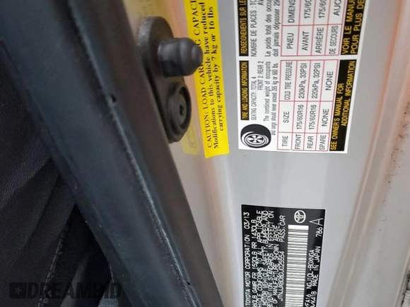 2013 Scion iQ with VIN JTNJJXB08DJ025554, listed as a Copart auction lot 88923885 with 110,378 mi miles and Salvage title. Bid and sale history available at DreamBid. Image 14.
