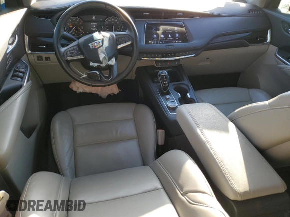 2021 Cadillac XT4 FWD Premium Luxury z VIN 1GYFZCR43MF021302, wystawiony jako Copart lot #41668755 z przebiegiem 46 047 mil mil oraz Szkody całkowita. Historia ofert i sprzedaży dostępna na DreamBid. Obrazek 8.