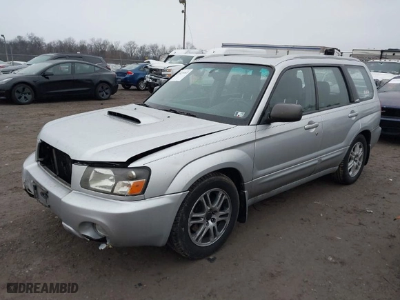2004 Subaru Forester (Natl) XT with VIN JF1SG69694H733997, listed as a IAAI auction lot 41459463 with 219,973 mi miles. Bid and sale history available at carsss.com. Image 2.