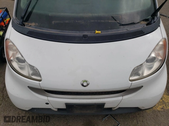 2012 Smart fortwo Pure с VIN WMEEJ3BA1CK573090, выставлен на аукционе Copart как лот 59881025 с пробегом 128 086 миль миль и Чистый • Clean title. История ставок и продаж доступна на DreamBid. Изображение 11.