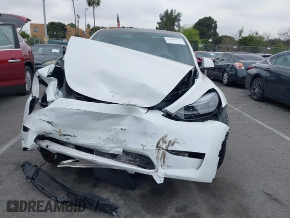 2024 Tesla Model Y with VIN 7SAYGDED6RF166543, listed as a IAAI auction lot 41713362 with Not Provided miles and . Bid and sale history available at DreamBid. Image 12.