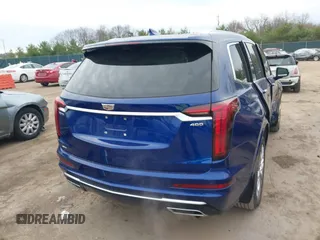 2023 Cadillac XT6 AWD Premium Luxury with VIN 1GYKPDRS2PZ126666, listed as a IAAI auction lot 40963833 with 23,535 mi miles and . Bid and sale history available at DreamBid. Image 4.