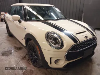 2023 MINI Clubman Cooper S with VIN WMWXJ1C02P2S77645, listed as a IAAI auction lot 41300674 with 34,302 mi miles. Bid and sale history available at carsss.com. Image 1.