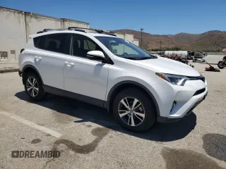 2018 Toyota RAV4 XLE with VIN JTMWFREV1JD122524, listed as a Copart auction lot 63707745 with 51,003 mi miles and Salvage title. Bid and sale history available at DreamBid. Image 4.