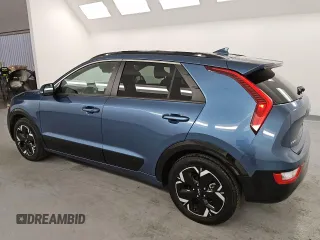 2023 Kia Niro Wind with VIN KNDCR3L1XP5036557, listed as a Copart auction lot 52805055 with 56,357 mi miles and Salvage Title. Bid and sale history available at carsss.com. Image 2.
