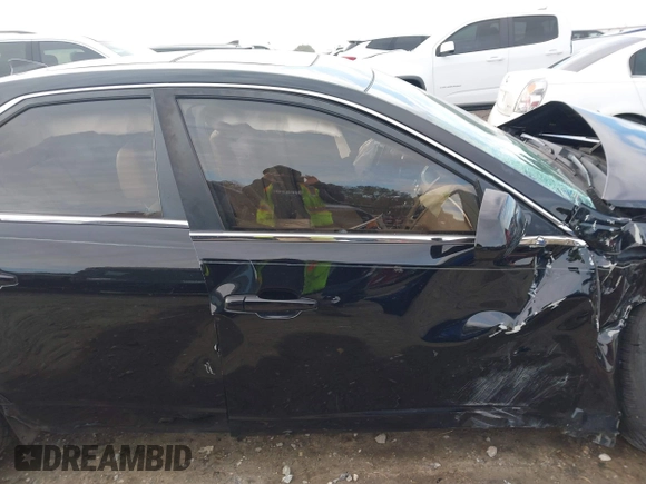 2011 Cadillac CTS Premium with VIN 1G6DP5ED2B0171652, listed as a IAAI auction lot 41229368 with 162,064 mi miles and . Bid and sale history available at DreamBid. Image 19.