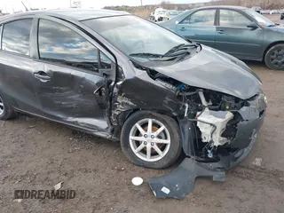 2012 Toyota Prius c One with VIN JTDKDTB31C1029950, listed as a IAAI auction lot 41223112 with 117,660 mi miles. Bid and sale history available at carsss.com. Image 6.