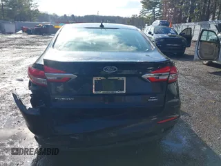 2020 Ford Fusion SE z VIN 3FA6P0LU4LR158954, wystawiony jako IAAI lot #41474425 z przebiegiem 76 966 mil mil oraz . Historia ofert i sprzedaży dostępna na DreamBid. Obrazek 16.