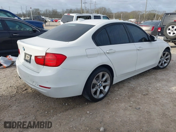 2015 BMW 3 Series 320i with VIN WBA3B1G56FNT64298, listed as a IAAI auction lot 41695116 with 125,926 mi miles. Bid and sale history available at carsss.com. Image 4.