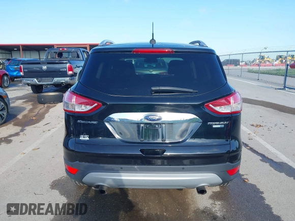 2016 Ford Escape Titanium with VIN 1FMCU9J97GUC21242, listed as a IAAI auction lot 42431567 with 96,946 mi miles and . Bid and sale history available at DreamBid. Image 16.