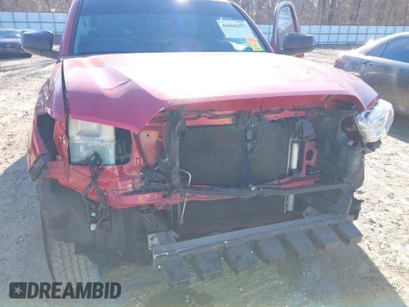 2018 Toyota Tacoma SR with VIN 5TFRX5GN9JX124598, listed as a IAAI auction lot 41666257 with 120,555 mi miles and . Bid and sale history available at DreamBid. Image 6.
