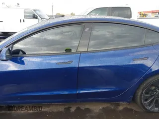 2022 Tesla Model 3 Performance with VIN 5YJ3E1EC7NF306192, listed as a IAAI auction lot 41453931 with 36,450 mi miles. Bid and sale history available at carsss.com. Image 13.