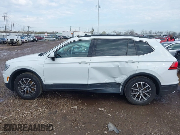 2019 Volkswagen Tiguan SE with VIN 3VV2B7AX7KM125053, listed as a IAAI auction lot 41892539 with 78,865 mi miles and . Bid and sale history available at DreamBid. Image 14.
