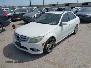 2010 Mercedes-Benz C-Class C 300 Sport with VIN WDDGF5EB1AR086684, listed as a IAAI auction lot 42064398 with 206,659 mi miles. Bid and sale history available at carsss.com. Image 2.