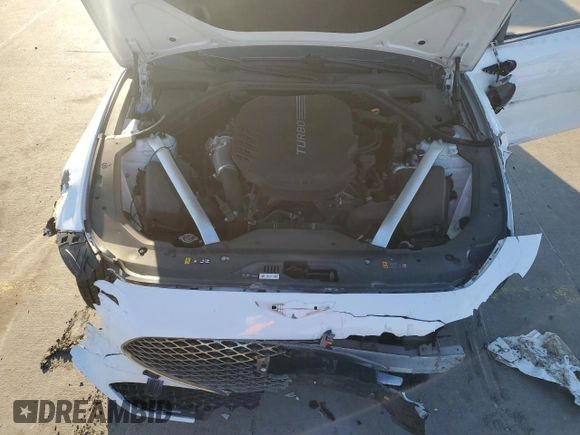 2022 Genesis G70 3.3T with VIN KMTG54TE5NU094831, listed as a Copart auction lot 83879004 with 57,449 mi miles and Salvage Title. Bid and sale history available at DreamBid. Image 11.