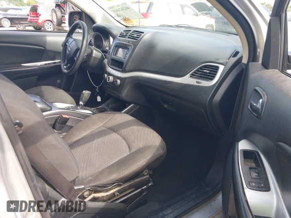 2014 Dodge Journey SE with VIN 3C4PDCAB7ET268221, listed as a IAAI auction lot 40262445 with 153,490 mi miles and . Bid and sale history available at carsss.com. Image 5.