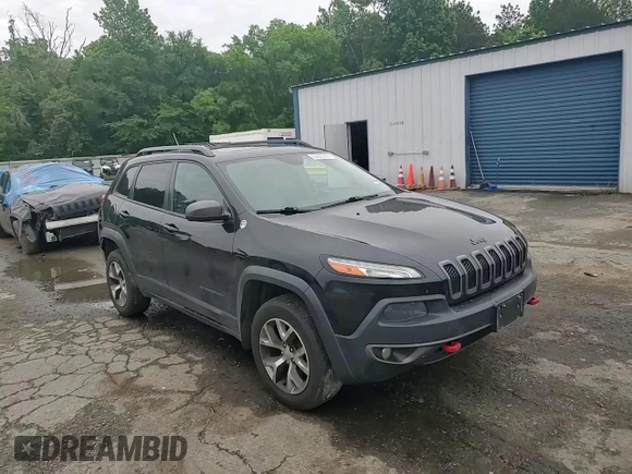 2014 Jeep Cherokee Trailhawk with VIN 1C4PJMBS6EW211385, listed as a Copart auction lot 55923255 with 162,753 mi miles and Clean title. Bid and sale history available at DreamBid. Image 13.