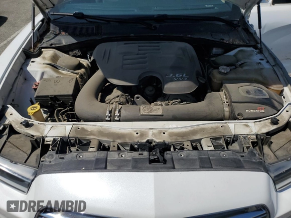 2013 Dodge Charger SE z VIN 2C3CDXBG3DH549962, wystawiony jako Copart lot #55110985 z przebiegiem 183 071 mil mil oraz Szkoda całkowita • Salvage title. Historia ofert i sprzedaży dostępna na DreamBid. Obrazek 11.