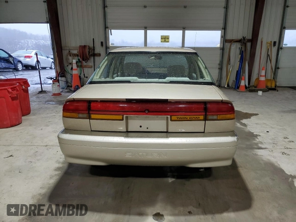 1995 Saturn SL with VIN 1G8ZK5271SZ238117, listed as a Copart auction lot 83723624 with 80,535 mi miles and Clean title. Bid and sale history available at DreamBid. Image 6.