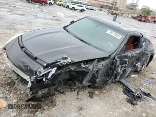 2014 Nissan 370Z Nismo z VIN JN1AZ4EH0EM634461, wystawiony jako Copart lot #53375685 z przebiegiem 171 858 mil mil oraz Szkoda całkowita • Salvage title. Historia ofert i sprzedaży dostępna na DreamBid. Obrazek 1.