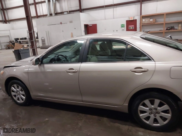 2007 Toyota Camry CE with VIN 4T1BE46K87U712670, listed as a IAAI auction lot 41797440 with 202,595 mi miles. Bid and sale history available at carsss.com. Image 14.