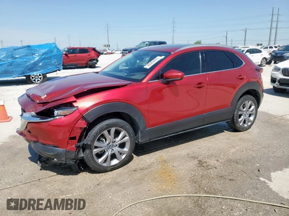 2021 Mazda CX-30 Premium with VIN 3MVDMBDL1MM314747, listed as a Copart auction lot 56669495 with 26,052 mi miles and Salvage title. Bid and sale history available at DreamBid. Image 1.