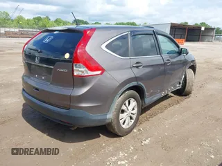 2014 Honda CR-V EX z VIN 2HKRM4H58EH621063, wystawiony jako IAAI lot #42253838 z przebiegiem 119 046 mil mil oraz . Historia ofert i sprzedaży dostępna na DreamBid. Obrazek 4.